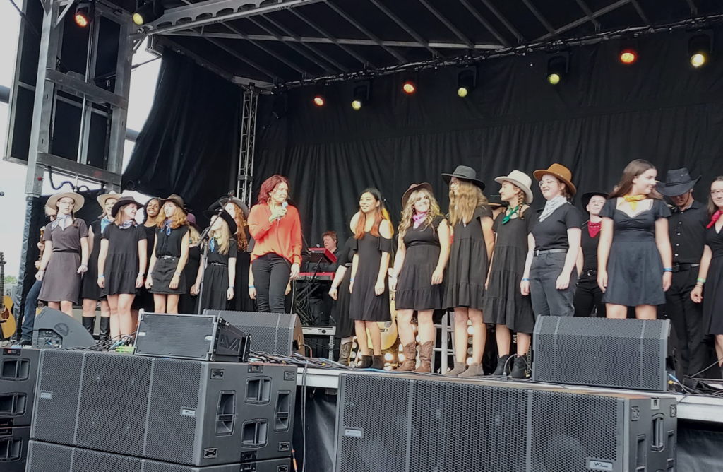 Rosanne Cash on stage with Highlands Youth Ensemble
